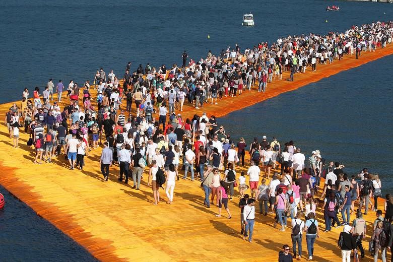 Bulgarian-born American artist Christo's Floating Piers walkway on Lake Iseo in Italy.