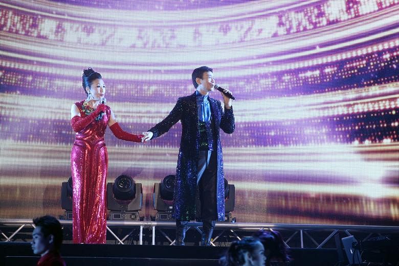 Liza Wang will be performing with Adam Cheng at a concert here next month.