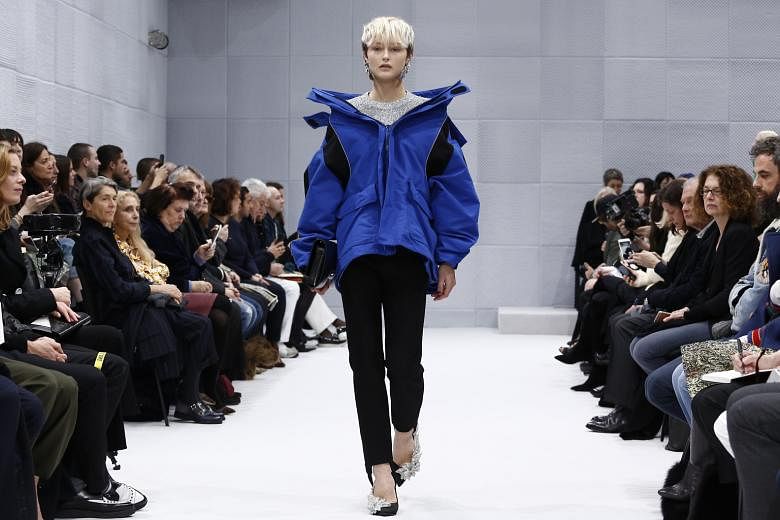 Designer Demna Gvasalia's first women's show for Balenciaga in March featured his reworked Puffer coats.
