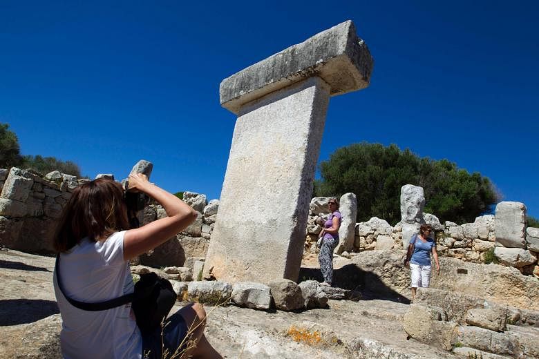 A sight to behold: A large Taula (Table in Catalan), a Talayotic monument, erected at the Talayotic settlement of Torralba d'en Salort, on the island of Menorca in Spain. The wondrous details of the world await us all: It just can take a few weeks to