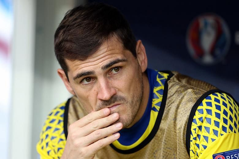 Iker Casillas watching from the bench during Spain's 0-2 loss to Italy in the round of 16 at the Stade de France.