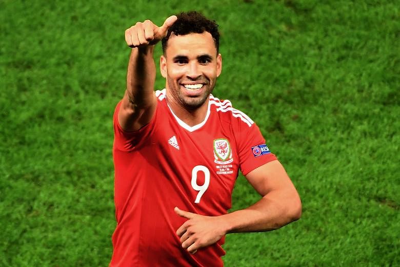 Hal Robson-Kanu of Wales celebrates after putting Wales in front during the 3-1 Euro quarter-final win over Belgium.
