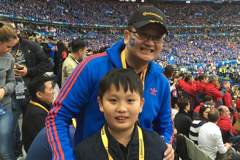 Simon Yeo and son Josh soaking in the atmosphere during the quarter-final at the Stade de France, where the hosts beat Iceland 5-2.