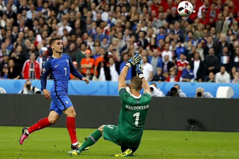 Antoine Griezmann chipping the ball over goalie Hannes Halldorsson for France's fourth goal, after Iceland's high defence line was picked apart yet again.