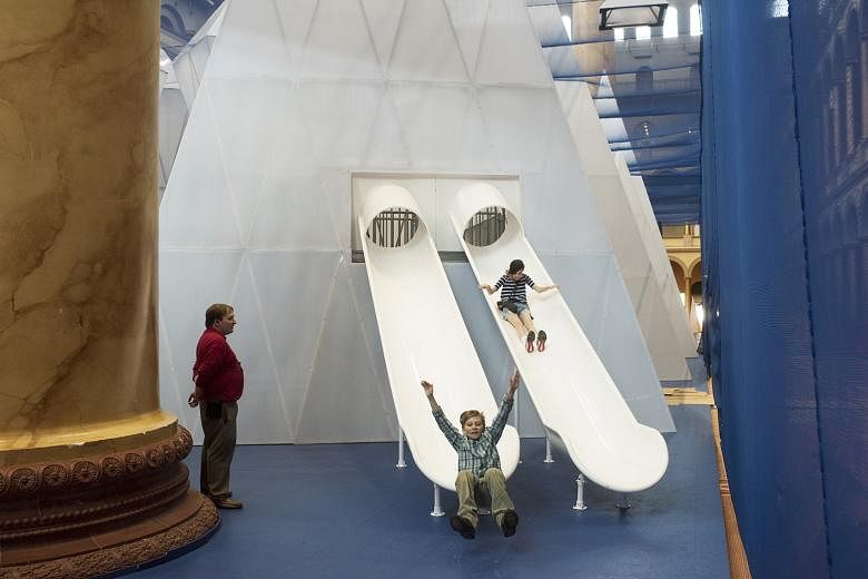 A double slide (left) at the Icebergs exhibition (above), which was inspired by the designers' interest in climate change.