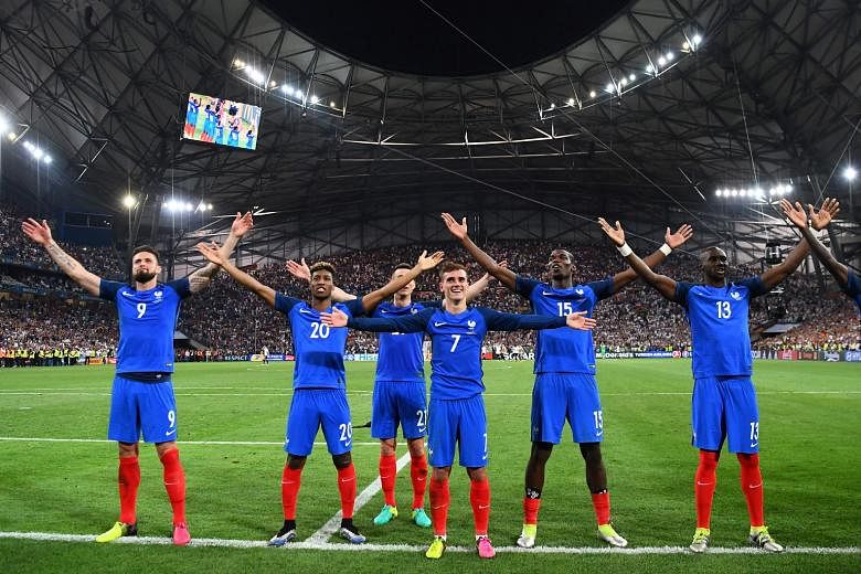 Victorious France players acknowledging their fans after conquering world champions Germany in the semi-final. They will be hoping to provide their baying home supporters with more reasons to celebrate after tonight's final against Portugal.