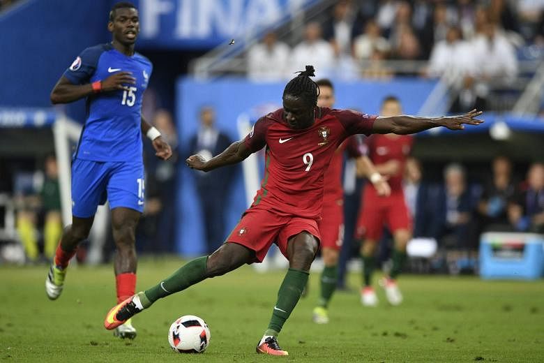 Portugal forward Eder (No. 9), widely regarded as a fringe player, scores for the underdogs against host nation France with 11 minutes remaining in extra time in the Euro 2016 final on Sunday.