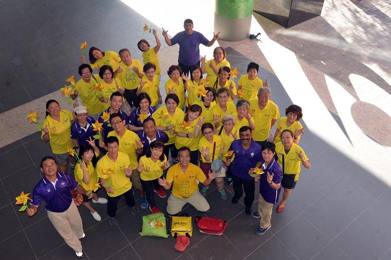 Founder Johnson Ong (kneeling) with some of the 250 U Volunteers who will be involved in the SNG.