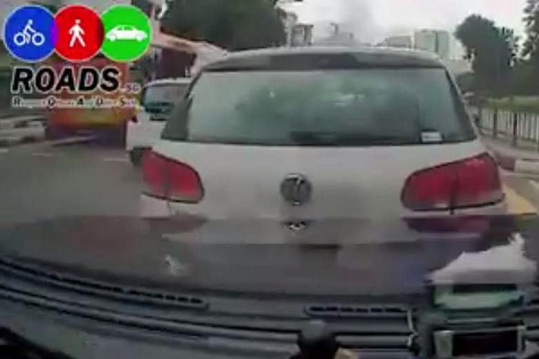 The video, filmed on a dashboard camera, showed the driver of the white Volkswagen Polo (left) hitting his brakes repeatedly and switching lanes quickly in front of the car (right), before braking abruptly, apparently resulting in the crash.