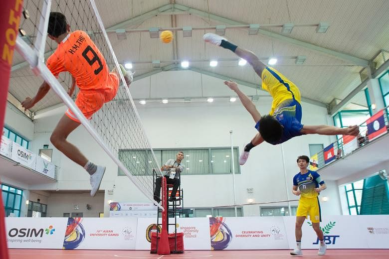 Thailand bagged its 50th Asean University Games gold yesterday, when the men's doubles sepak takraw team of Jutawat Srithong and Korakot Kamolpop (in yellow and blue) defeated Htet Myat Thu and Wai Lin Aung of Myanmar 2-1 in the final, held at the Si