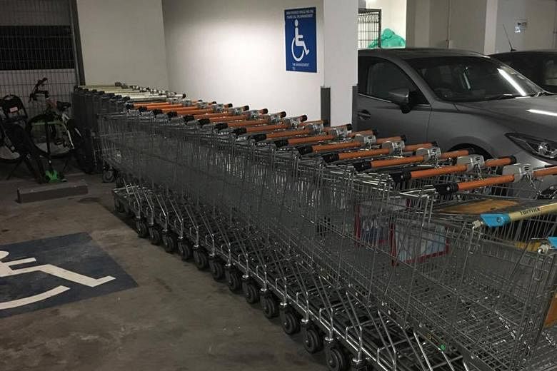 The supermarket trolleys had apparently been left in the disabled parking space in the basement carpark of Silversea condominium for more than half a year. They were removed yesterday.