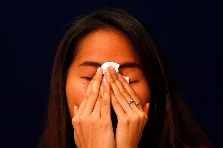 Ratchanok Intanon crying during a news conference at a hotel in Bangkok. She is one of the key challengers to China's bid to retain all five badminton golds from London 2012.