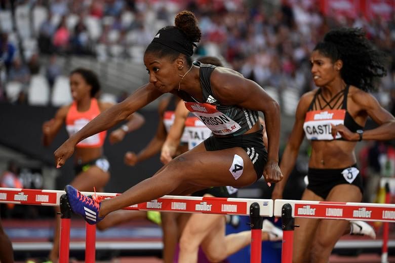 Kendra Harrison of the United States in action during the 100m hurdles heat at the London Diamond League meet. She later ran 12.20sec to break Yordanka Donkova's world record.