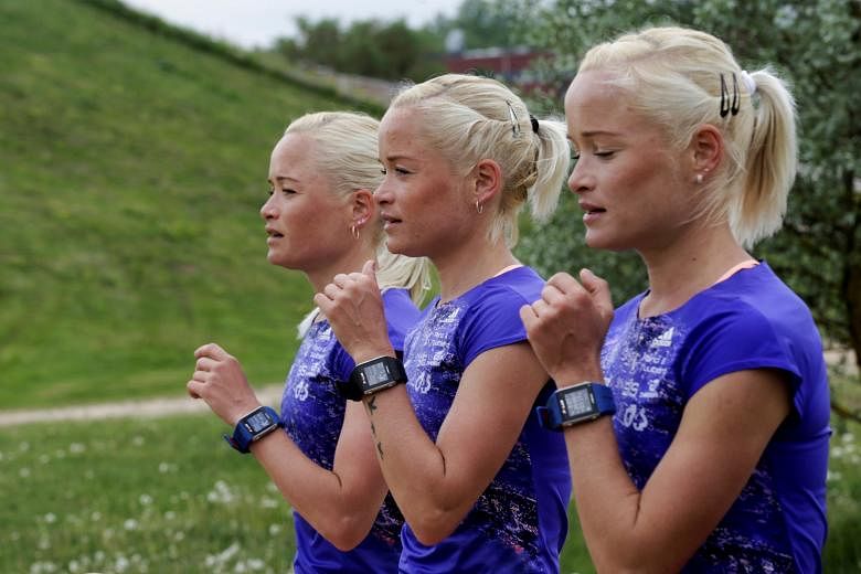 Estonia's female marathon runners for the Olympics (left to right) Lily, Liina and Leila Luik running during a training session in Tartu, Estonia, ahead of the Rio Games next month.