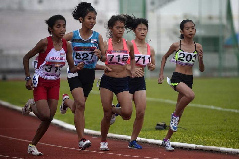 Cambodia's 13-year-old Choronei Ngoun (far right), the youngest runner in yesterday's 3,000m girls' final at the Asean Schools Games in Chiang Mai, Thailand, aims to win a medal at the 2023 SEA Games.