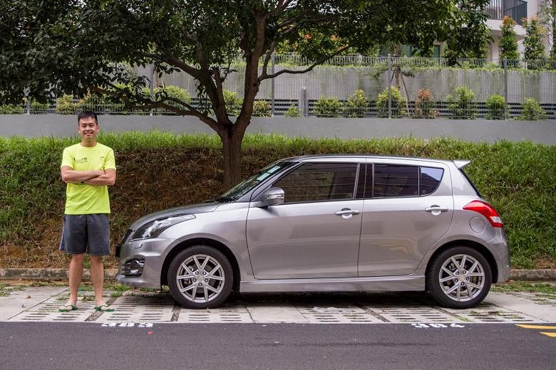 Performance Motors product executive Derrick Koh with his Suzuki Swift Sport.