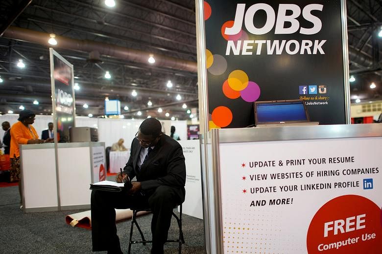 A job fair in the US. The country's employment index fell to 49.4 in July from 50.4 a month earlier, contracting for the seventh time in the past eight months.