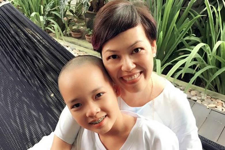Zara Yong (with her mother Zerlina Sim), 11, had a shave and raised more than $35,000 for the Children's Cancer Foundation.