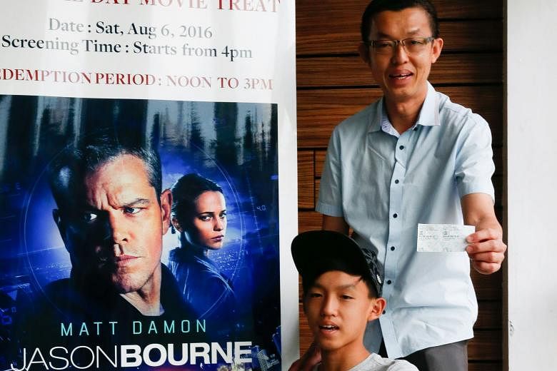 Mr Andy Tan and his son Jerome were among those who received tickets for action thriller Jason Bourne.