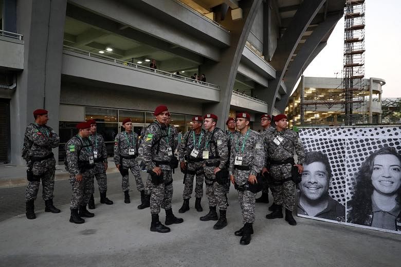 Brazilian military personnel outside the Maracana Stadium ahead of the opening ceremony of the Olympics in Rio de Janeiro.
