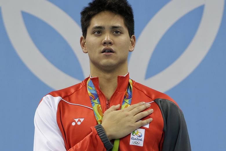Hand on heart after the greatest swim in his life, new Olympic 100m fly champion Joseph Schooling savours a Majulah moment at the medal ceremony. His calm demeanour belies his pride and honour after his stupendous achievement.