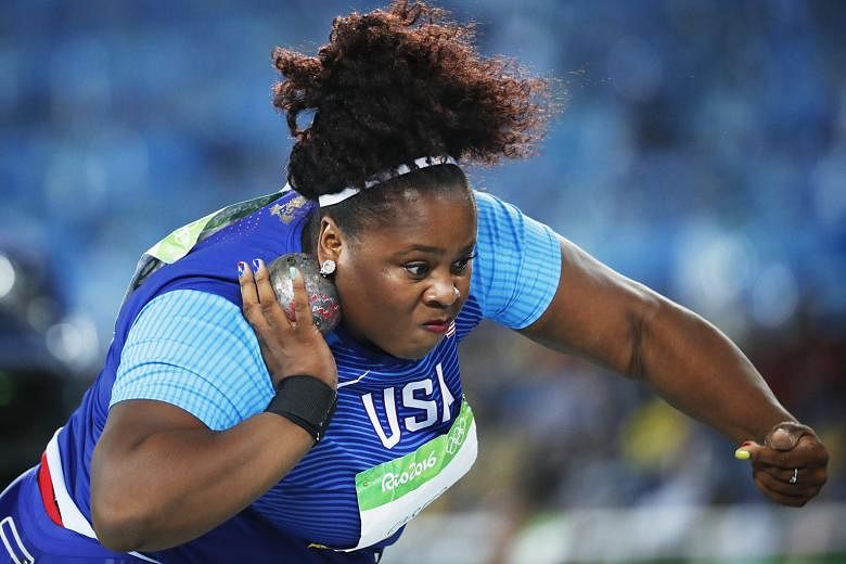 Michelle Carter of the United States competing in the shot put final at the Olympic Stadium in Rio de Janeiro, in which she won the gold medal.
