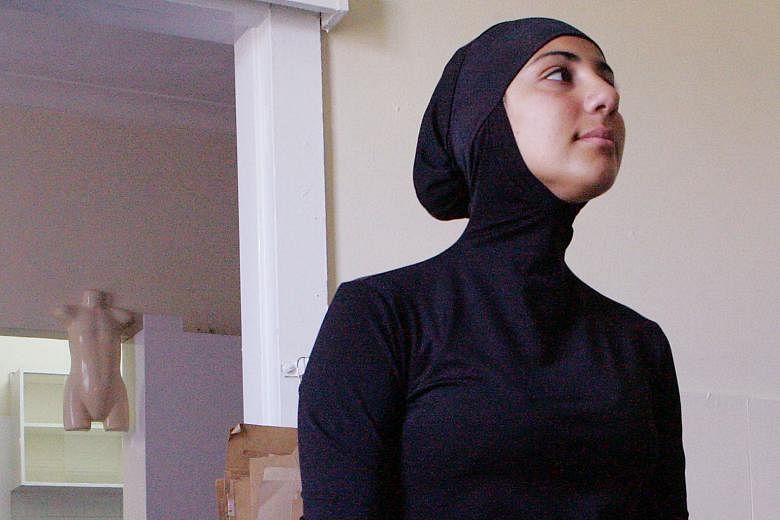 A 2007 photo of a model wearing a swimsuit for Muslim wormen by designer Aheda Zanetti.