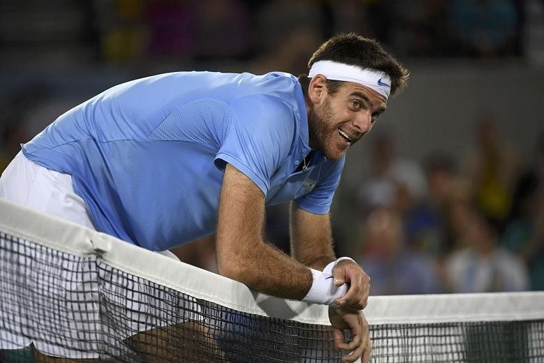 Juan Martin del Potro, who made a dramatic comeback to the game this year after a series of injuries that saw him plummet out of the top 1,000, shows the strain of the four-set loss to Andy Murray in the men's singles final at the Rio Olympics. Del P