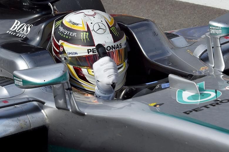 Mercedes' Lewis Hamilton giving the thumbs-up at the end of the Belgian Grand Prix on Sunday. The world championship leader finished third, despite starting the race in 21st place on the grid.