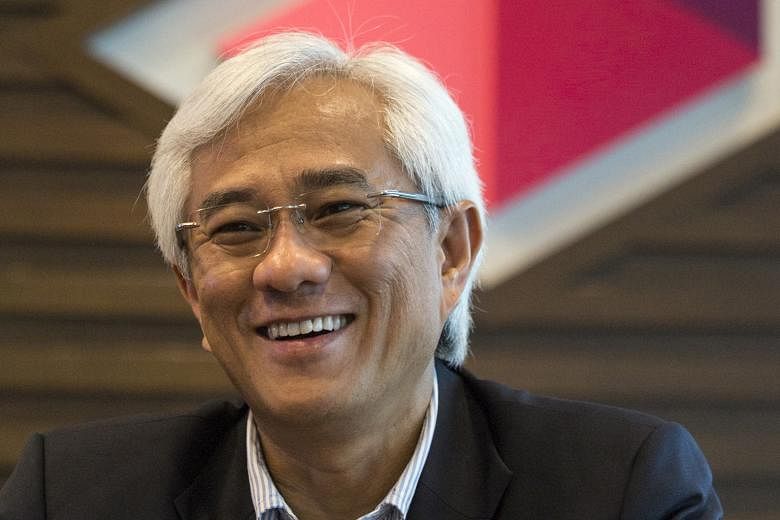 Axiata is M1's biggest shareholder, with a 28.5 per cent stake. Mr Jamaludin (above) said it would be good for Axiata to raise its stake and that if the price is right, the company will seriously consider it.