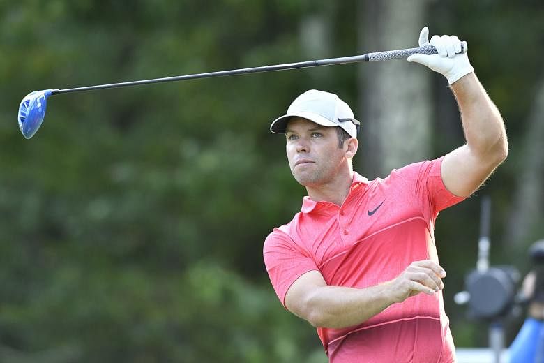 Paul Casey watches his tee shot on the 18th hole during the third round of the 2016 Deutsche Bank Championship at TPC Boston on Sunday. The US-based British golfer, aiming for his second PGA Tour title, led by three shots after starting the day secon