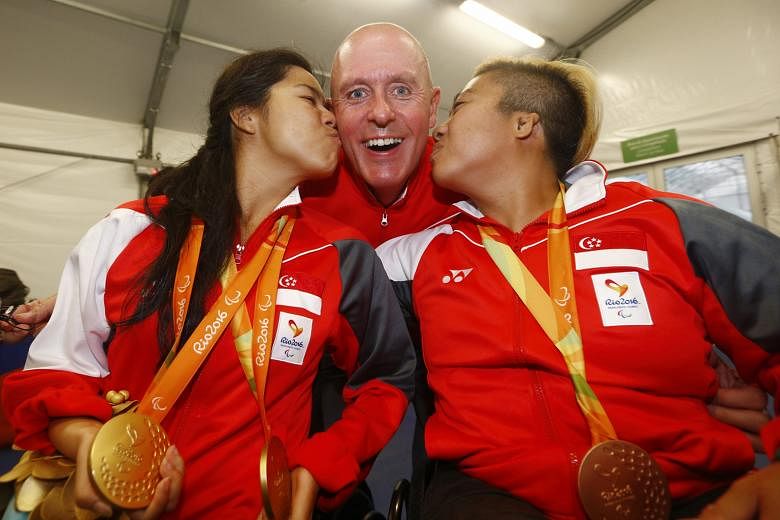 Coach Mick Massey with Yip Pin Xiu (left) and Theresa Goh after their medal-winning feats at the Paralympics in Rio. The Briton began coaching them after being approached by the Singapore Disability Sports Council and Singapore Sports Institute when 