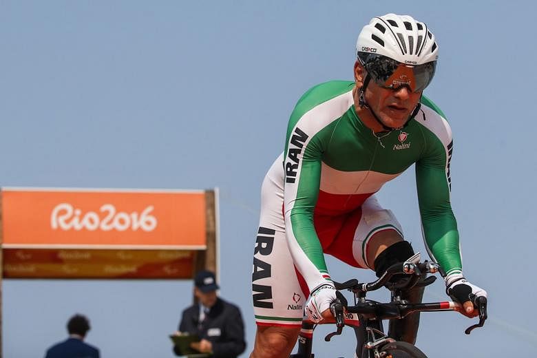 Cyclist Sarafraz Bahman Golbarnezhad of Iran shortly after the start of the men's road race C4-5. He died on Saturday after crashing during the race and suffering a subsequent cardiac arrest.