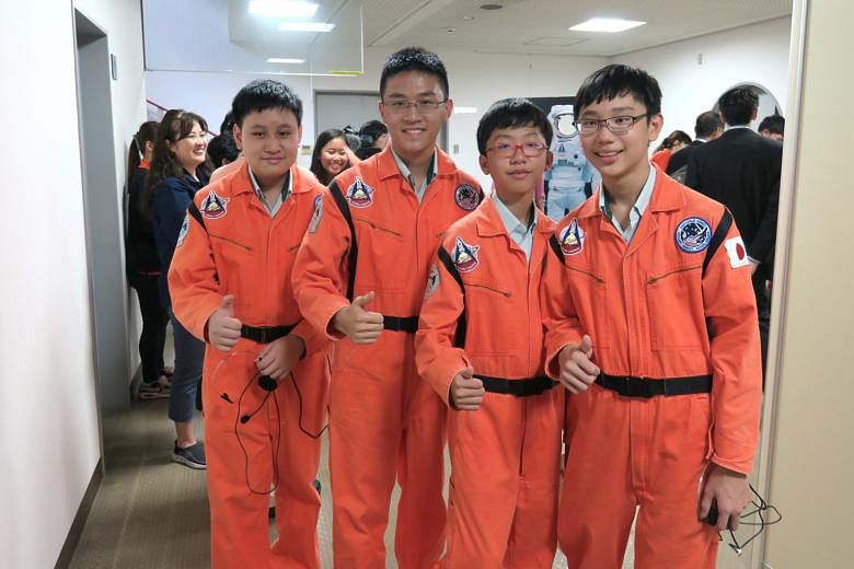 From left: Ethan Tan, Wang Hao Ming, Caleb Goh and Justin Chua of Hillgrove Secondary School during their visit to the Japan Aerospace Exploration Agency. Their idea for an experiment is the first one from Singapore to be chosen for the Try Zero-G fo