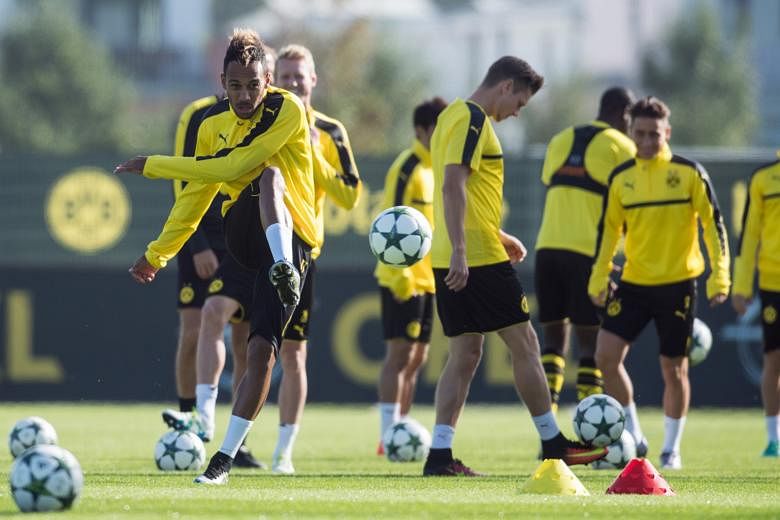 Borussia Dortmund's Pierre-Emerick Aubameyang (far left) taking part in a training session before his side's Group F Champions League clash against Real Madrid today.