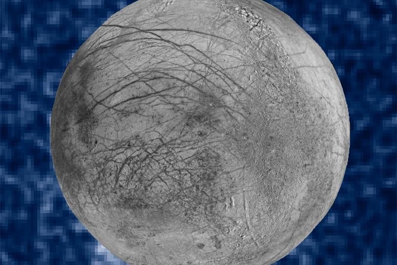 A Nasa photo showing a composite image of suspected plumes of water vapour erupting at the 7 o'clock position off Jupiter's moon Europa. The plumes were captured by the Hubble Space Telescope.