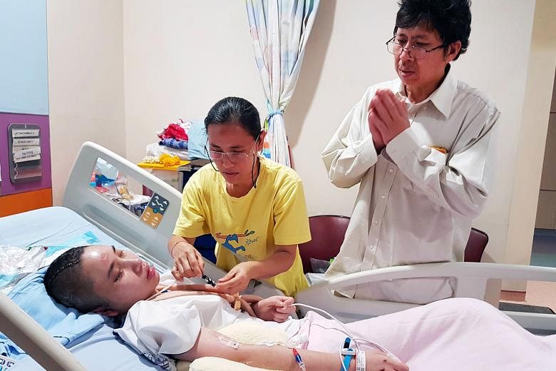 Aroonrak's mother, Mrs Jiranee, and father Sarayuth Jattanathammajit (both above) have flown in from Thailand and are at the hospital every day to be with their daughter. The 16-year-old has undergone two brain operations since the accident.