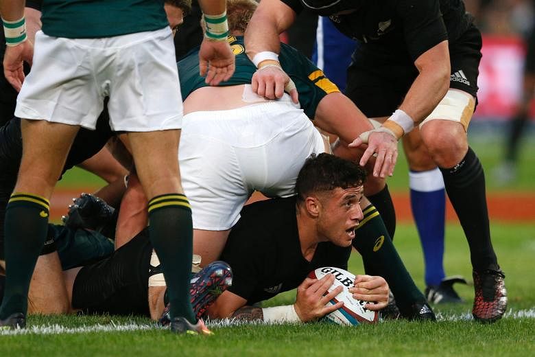Despite the attention of the South African players, All Blacks' T.J. Perenara still managed to score two tries against the Springboks.