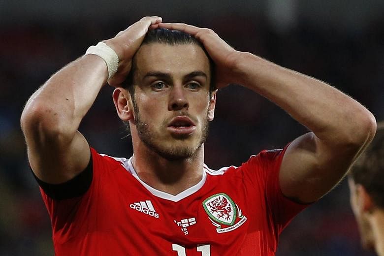 Gareth Bale looking dejected after Georgia stole a point in the match, which Euro 2016 semi-finalists Wales were expected to win easily.