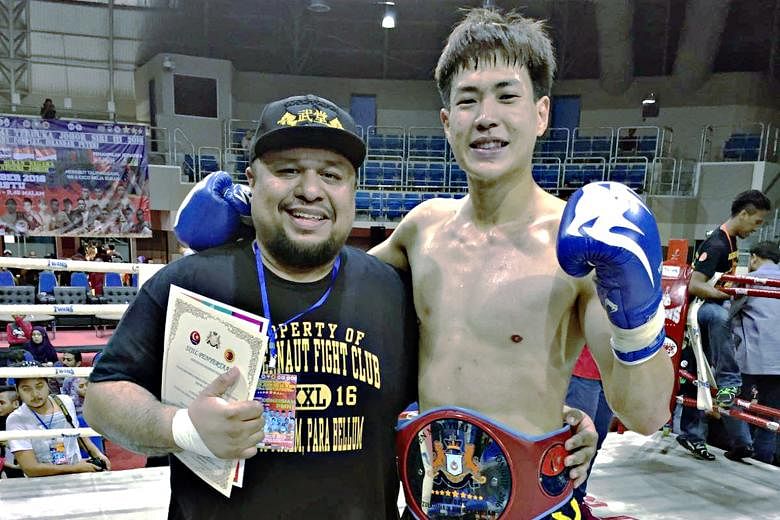 Terrence Teo, with coach Arvind Lalwani, beat his highly fancied Malaysian opponent in Johor in a unanimous five-round decision.