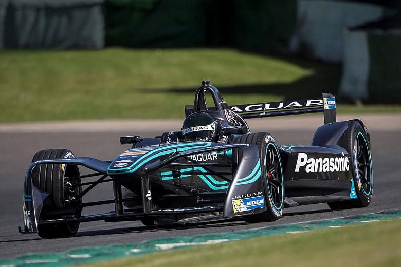 The Panasonic Jaguar Racing I-Type competed in the Formula E Championship Series, which started in Hong Kong. Drivers at the Formula E race going slow and steady at the first hairpin turn.