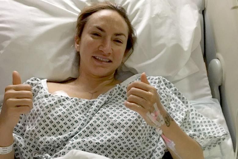 Ms Gabriel, three hours after surgery to remove her breasts last month. The 35-year-old underwent the double mastectomy as a precaution after she tested positive for the BRCA gene mutation.