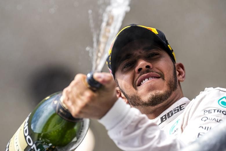 Lewis Hamilton celebrating a half-century of race victories in Austin, Texas on Sunday. Following numerous engine failures this season, he was only thinking of getting his car to the finish line.
