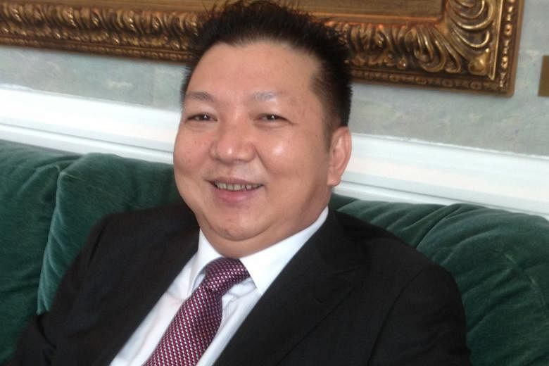 Mr Huang Min, former executive chairman of industrial waste gas treatment specialist China Environment. The firm said yesterday that Ms Huang Lu, Mr Huang's elder daughter, has to pay $2.2 million to law firm Rajah & Tann, which she was supposed to h