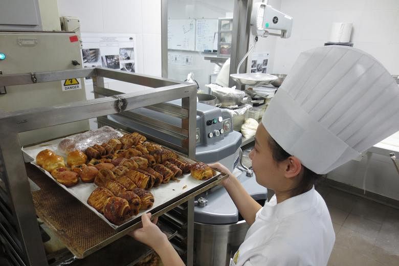 A chef at Mandarin Oriental Singapore setting aside excess pastries for donation to Food from the Heart, a non-profit organisation that channels unused food to the needy. At the 3R Awards for Hotels yesterday, Mandarin Oriental was one of several hot