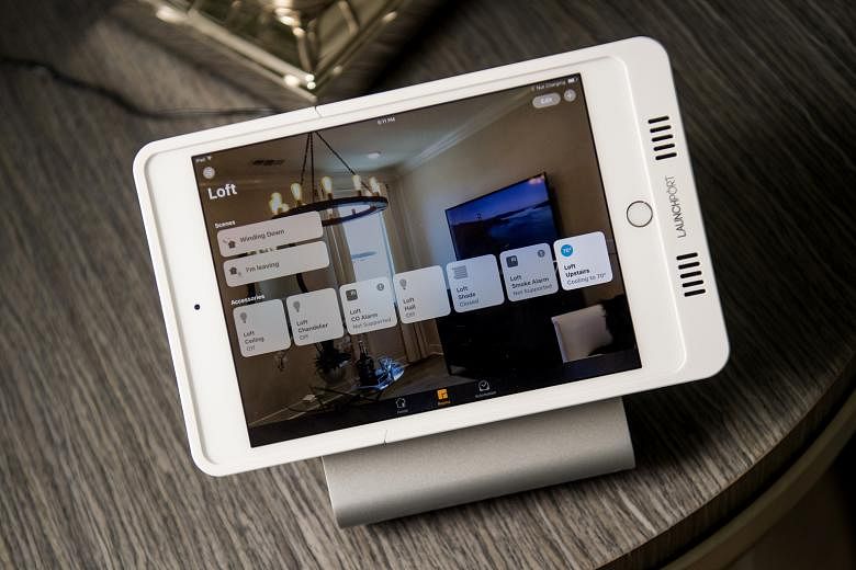 An iPad displaying smart home functions (left) inside a home at the Lennar Corp Marina Shores development in Alameda, California, in the United States.