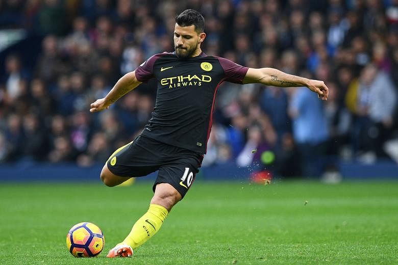 Manchester City's Sergio Aguero shooting during his two-goal performance in the first half against West Bromwich Albion on Saturday. He also set up a goal for Ilkay Gundogan in the 4-0 win.
