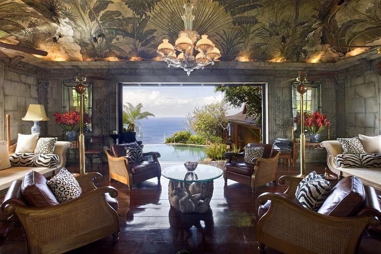 A dining pavilion (far left), a drawing room (above) and a bedroom (left) in the Mustique home of David Bowie.
