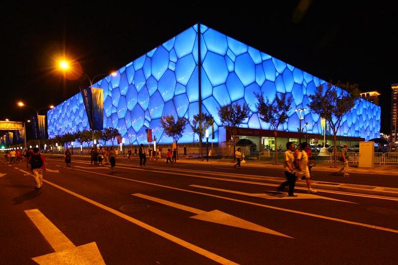 Mr Pauline was also one of the key designers of the Beijing National Aquatics Center (above) for the 2008 Olympics. Multi- disciplinary design practice Hassell's design principal John Pauline (above) and the Bosporus Olympic Stadium Proposal, Istanbu