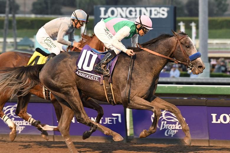 Arrogate and jockey Mike Smith overhauling California Chrome to win the Breeders' Cup Classic by half a length. He made up a deficit of seven lengths entering the final straight.